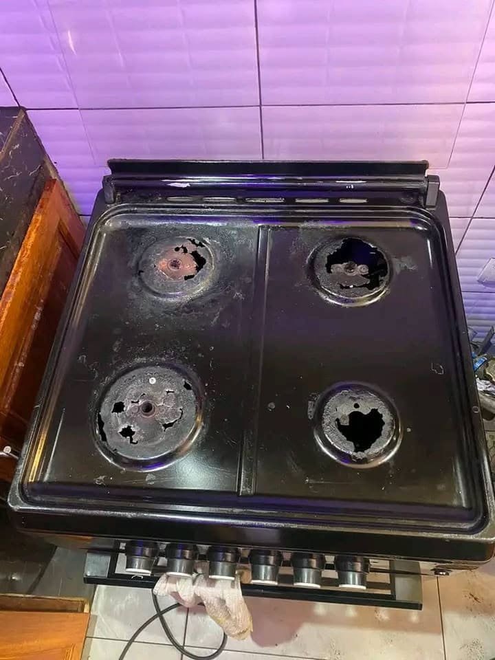 Before: Gas stove before and after a burner repair.